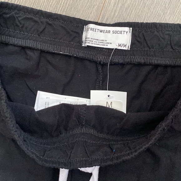 Black and white stretch dolphin shorts. Brand new! - Picture 3 of 3